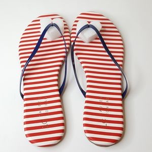 LC Lauren Conrad flips flops.